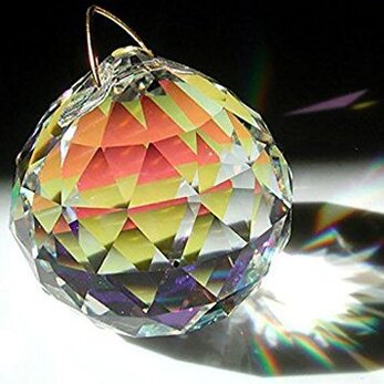 Faceted prism with light shining through